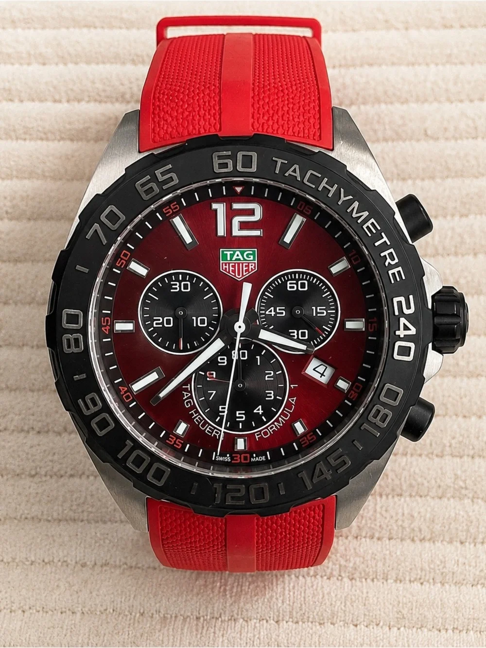 Tag Heuer Red Dial Chronograph with Black Tachymeter Bezel